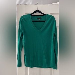 Green v-neck sweater